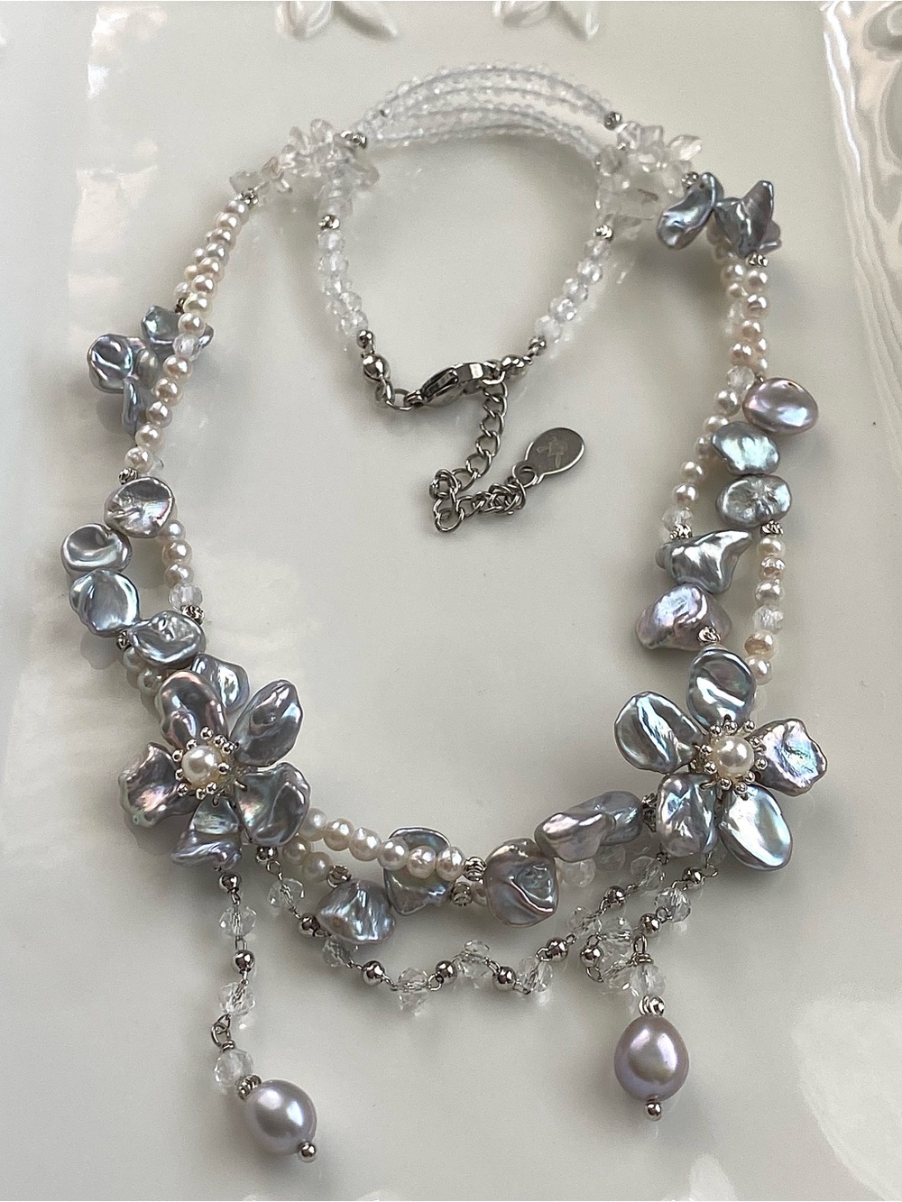 N309-High Quality Silver Petal Pearl Flower And Clear Quartz Braided Necklace